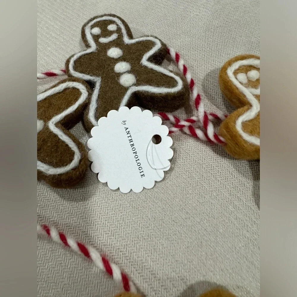 Anthropologie gingerbread men christmas garland wool decor holidays neutral home